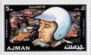 Briefmarke der Arabischen Emirate, die den Rennfahrer Gerhard Mitter darstellt (1935-1969) von School Arabic