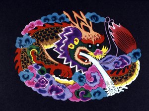 Chinesischer Papierschnitt und gefärbt mit einem Drachen von School Chinese