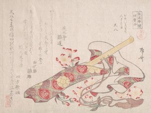 Shakuhachi, eine Art Bambusflöte, mit Hülle und Kirschblüten von Shinsai