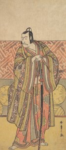 Ichikawa Danjuro V als Kudo Suketsune, reich gekleidet, lehnt sich auf sein Schwert, spätes 18. Jahrhundert von Shunsho