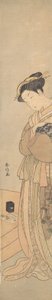 Eine Oiran, die einen schwarzen Hund hält von Suzuki Harunobu