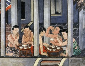 Menschen essen an niedrigen runden Tischen, genannt Kantoke, Mitte des 19. Jahrhunderts von Thai School