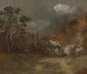 Schafe und Lämmer an einem Zaun