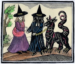 Eine schwarze und eine weiße Hexe mit einem Teufelstier