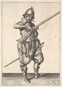 Ein Soldat auf Wache, der das Zündholz zwischen Daumen und Zeigefinger formt, aus den Scharfschützen s....