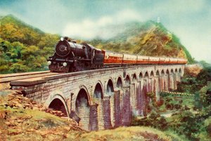 Zwischen Bombay und Delhi. Ein beeindruckender Blick auf den Frontier Mail, der über ein Viadukt fährt, 1935