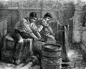 Schleifer bei der Arbeit an einem Rad, ca. 1880 von Unbekannt