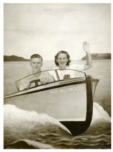 Mann und Frau in einem Boot namens "Miss Wildwood" ca. 1940 von Unbekannt