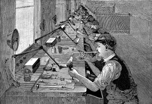 Löten von Fahrradteilen in einer amerikanischen Fabrik, um 1900 von Unbekannt