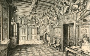 Die Eingangshalle. - Entlang der Wand sind viele alte Rüstungen., 1882