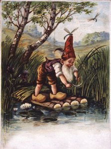 Zwerg schneidet vom Schilf an einem Teich
