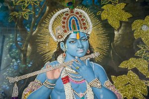 Hinduismus; Gemälde von Lord Krishna mit Flöte; Durgiana Mandir Vishnu Tempel; Amritsar; Punjab; Indien; Südasien; Asien