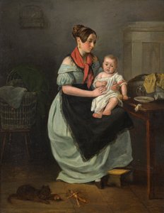 Mutter mit ihrem Kind auf dem Schoß