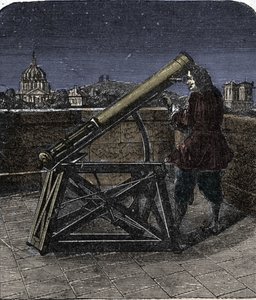 Isaac Newton (1642-1727), englischer Physiker, benutzt sein Teleskop.