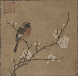 Vogel auf einem blühenden Zweig