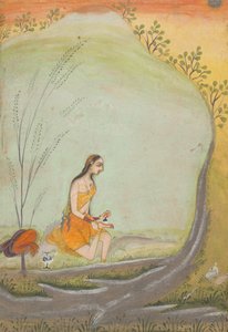 Eine Dame, die Henna auf ihren Fuß aufträgt