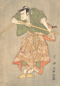 Der Schauspieler Kataoka Nizaemon in zeremoniellen Roben in Grün und Pink