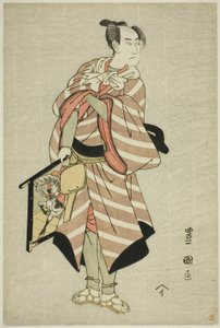 Der Schauspieler Sawamura Sojuro III als Packpferd-Mann Muchizo im Stück "Miyamairi Musubi no Kamigaki," aufgeführt im Kiri-Theater im elften Monat, 1797