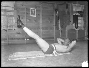 Englischer Boxer William Thomas Wells (Bombardier Billy Wells), posierend in Trainingskleidung, ca. 1911