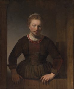 Junge Frau an einer offenen Halbtür von Workshop of Rembrandt van Rijn