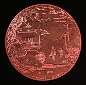 Runde geschnitzte Zinnoberbox und Deckel