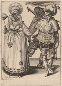 Ein Mann mit Turban führt eine Frau mit Pfauenfedern
