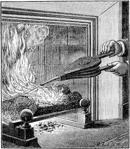 Feuer im Kamin: Ein Blasebalg entfacht die Flamme von . .