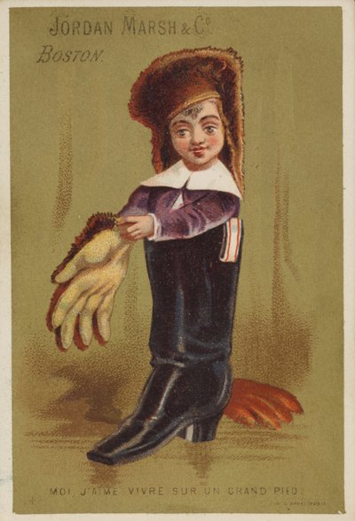 Junge steht in Erwachsenenstiefel von American School