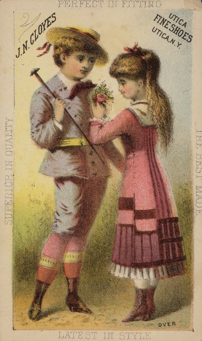 Mädchen steckt Knopfloch an Jungenjacke von American School