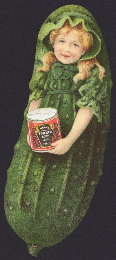 Mädchen, verkleidet als Gurke, hält eine Dose Heinz Tomatensuppe von American School