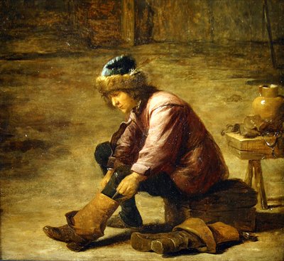 Ein junger Mann zieht einen Stiefel an von David Teniers the Younger