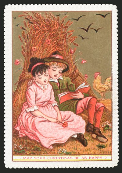 Junge liest Mädchen im Feld ein Buch vor von English School