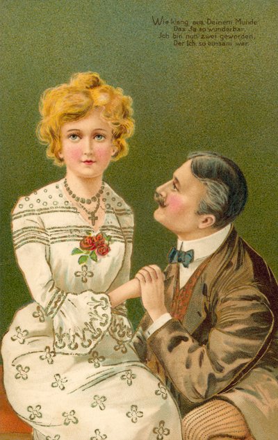 Mann hält die Hand einer jungen Frau von European School
