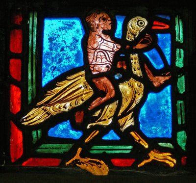 Eckstück eines Fensters, das das Gleichnis vom barmherzigen Samariter darstellt: Mann und Vogel von French School