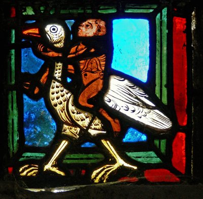 Eckstück eines Fensters, das das Gleichnis vom barmherzigen Samariter darstellt: Mann und Vogel von French School