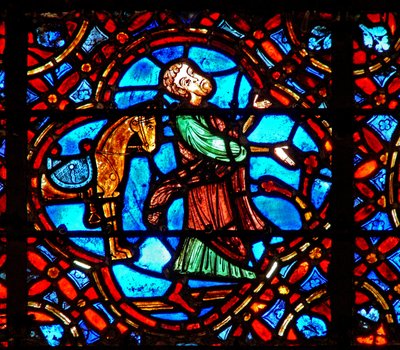 Fenster w12, Darstellung einer Szene im Fenster des barmherzigen Samariters: der Samariter steigt von seinem Pferd von French School