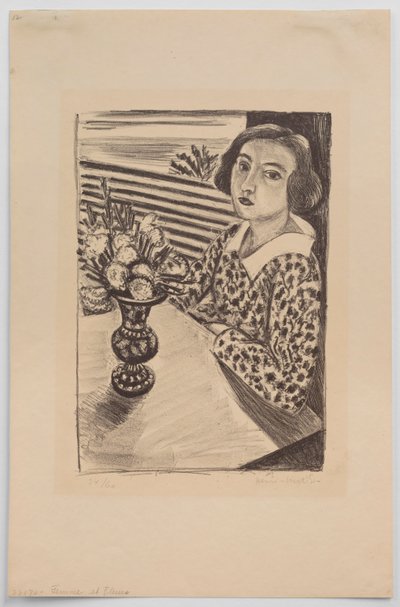Sitzendes junges Mädchen mit einem Blumenstrauß von Henri Matisse