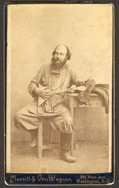 Porträt eines unbekannten Mannes mit Balalaika von Merritt and Van Wagner