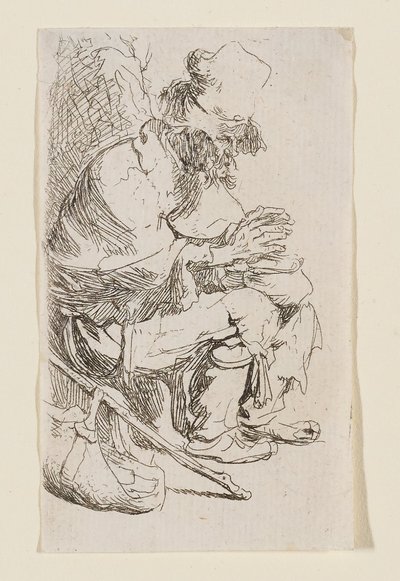 Bettler, der seine Hände an einer Feuerpfanne wärmt von Rembrandt van Rijn