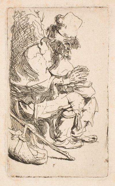 Bettler sitzt und wärmt seine Hände an einer Kohlenpfanne von Rembrandt van Rijn