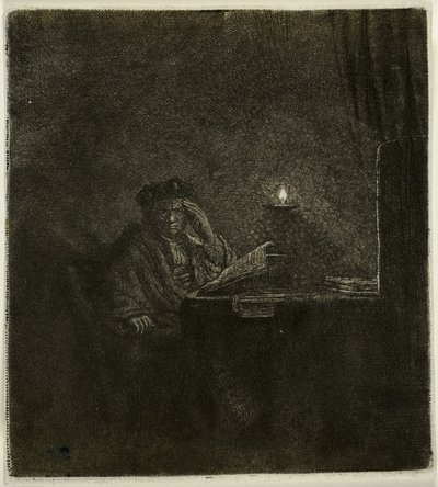 Student an einem Tisch bei Kerzenlicht von Rembrandt van Rijn