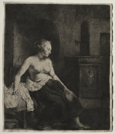 Frau sitzt halb angezogen neben einem Ofen von Rembrandt van Rijn