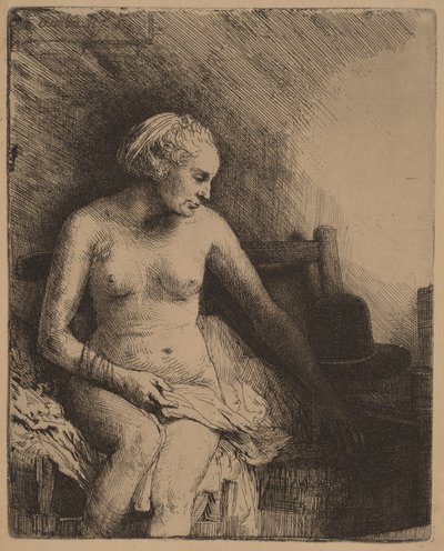 Frau beim Bad mit einem Hut neben sich von Rembrandt van Rijn