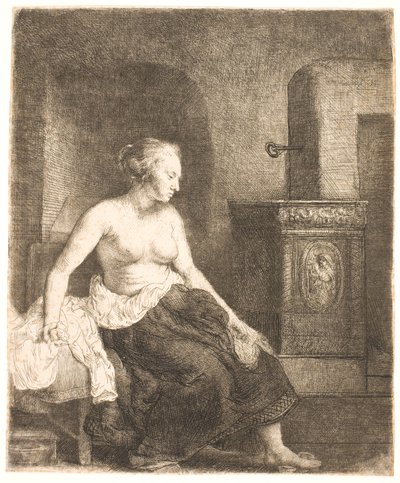 Frau, halb angezogen, neben einem Ofen sitzend von Rembrandt van Rijn