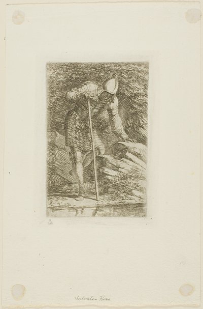 Ein Krieger in voller Rüstung in einer Grotte von Salvator Rosa
