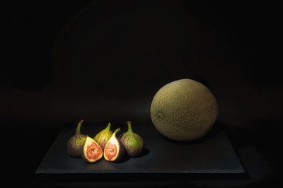 Stimmungsvolle Melone und Feigen von Saskia Dingemans