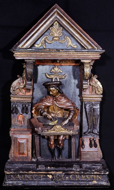 Schuhmacherschild mit der Inschrift unten „Saint Crespin“ - geschnitztes Holz von Unknown artist