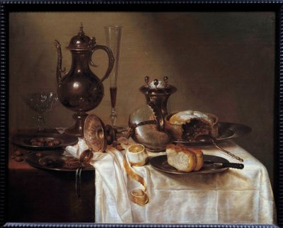 Stillleben mit Nautilus. Tisch bedeckt mit Silberwaren, einem Brot, einem Weinglas, einer Pastete und einer geschälten Zitrone. Gemälde von Willem Heda (1594-1670) 1642 Saint-Étienne, Museum der Schönen Künste von Willem Claesz. Heda