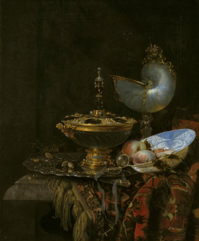 Prunkstillleben mit Holbeinschale, Nautiluspokal, Glaspokal und Obstschale von Willem Kalf