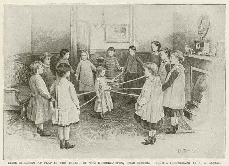 Blinde Kinder spielen im Wohnzimmer des Kindergartens in der Nähe von Boston von American School